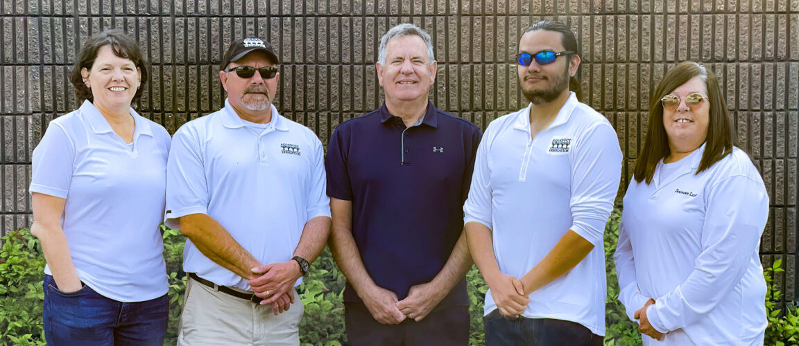 Owner of Aqueduct Irrigation William Holt with employees